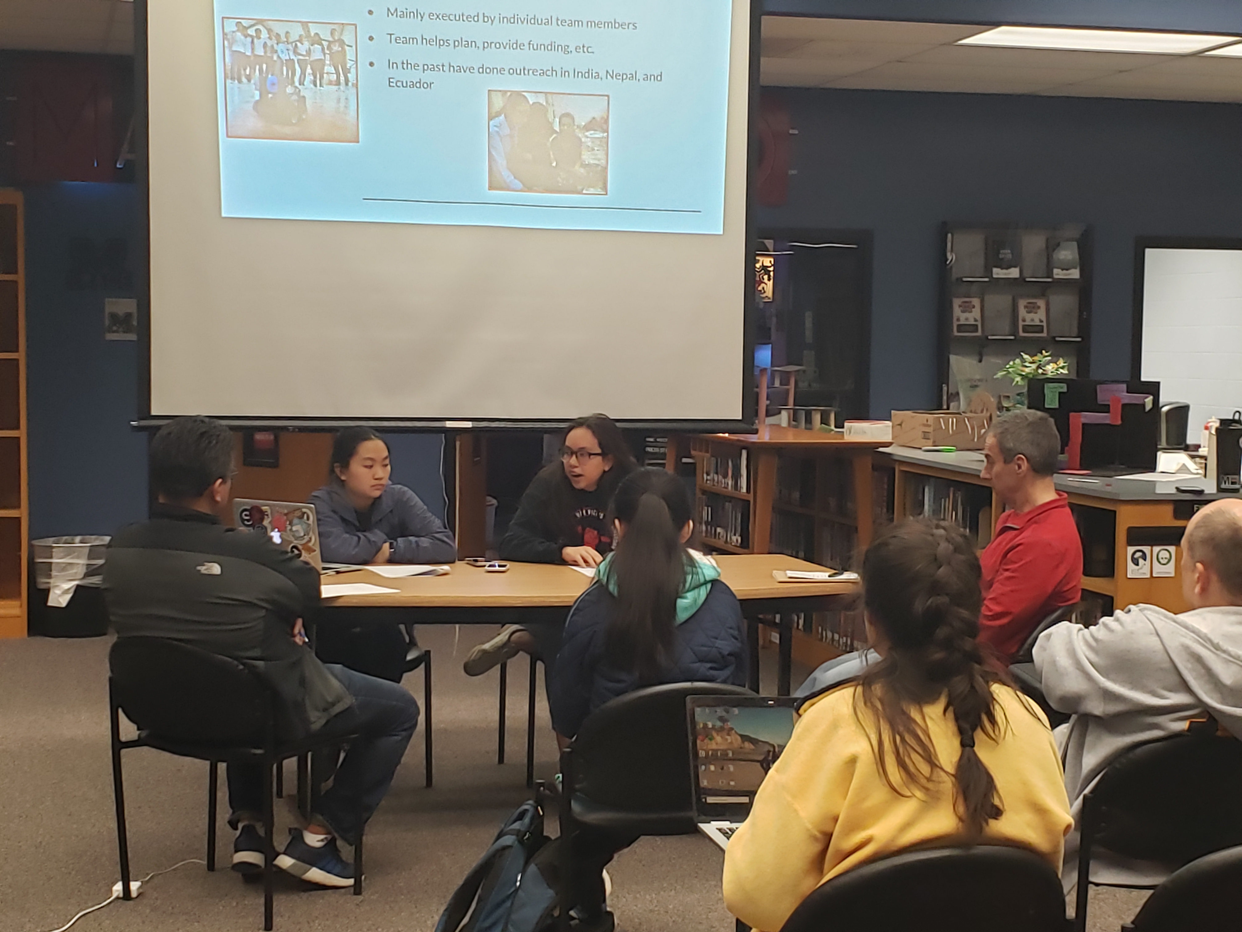 Students attending a 2019 workshop in an outreach discussion.