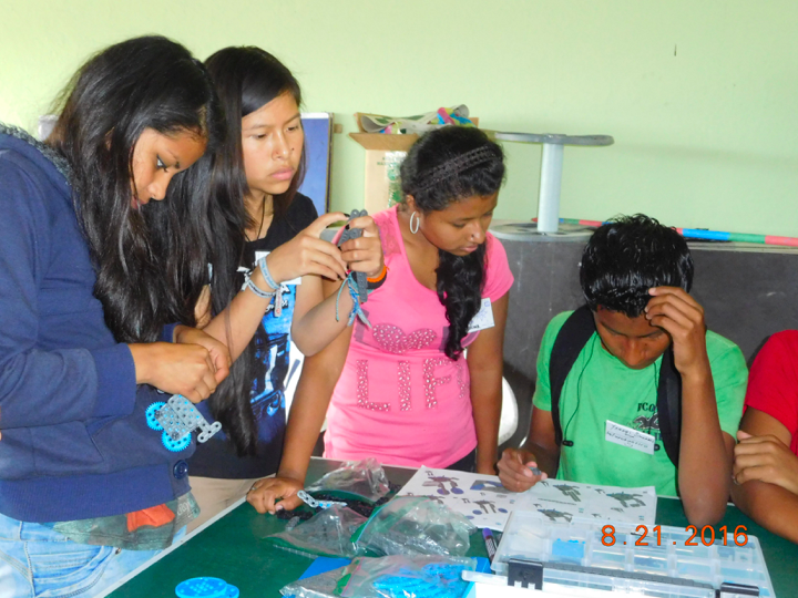 San Miguel de los Bancos students building robots.