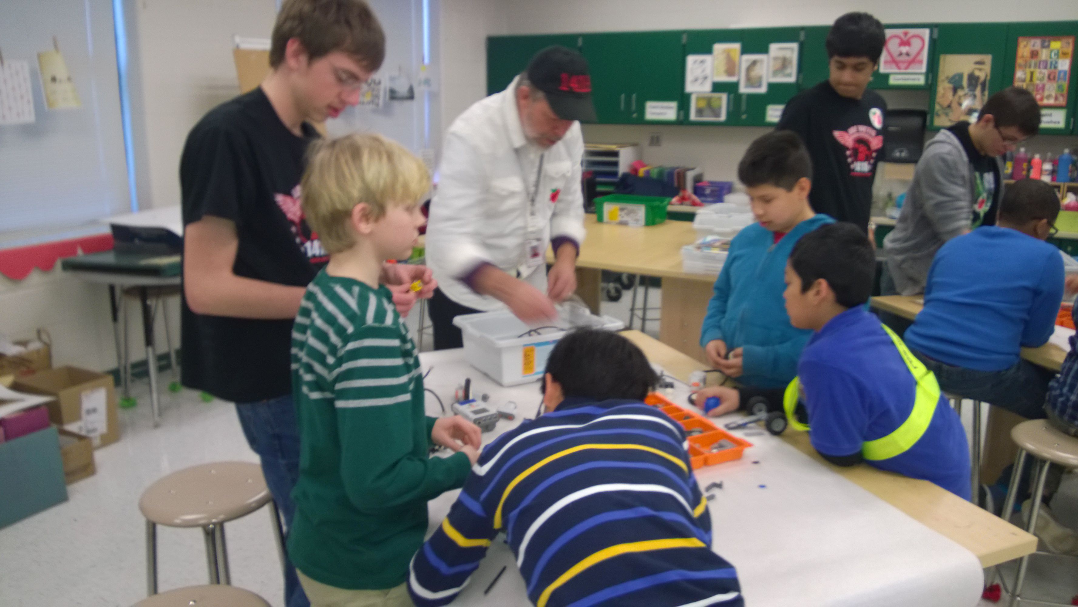 Children building a robot.