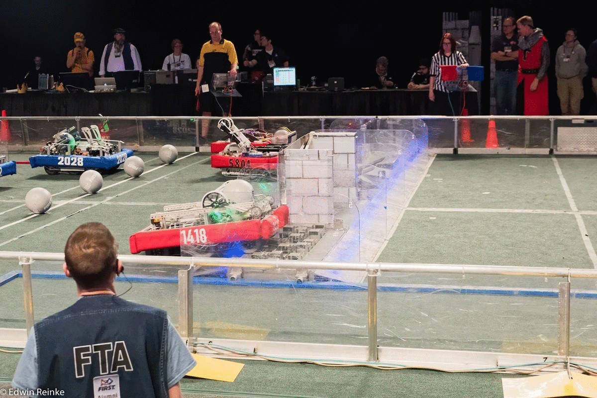 An animated graphic of our robot going over a defense.